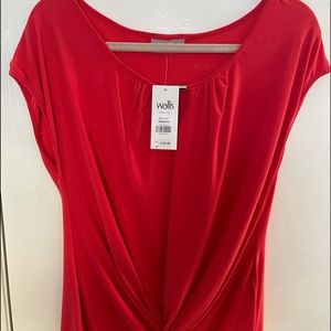 Coral colored top with twist accent